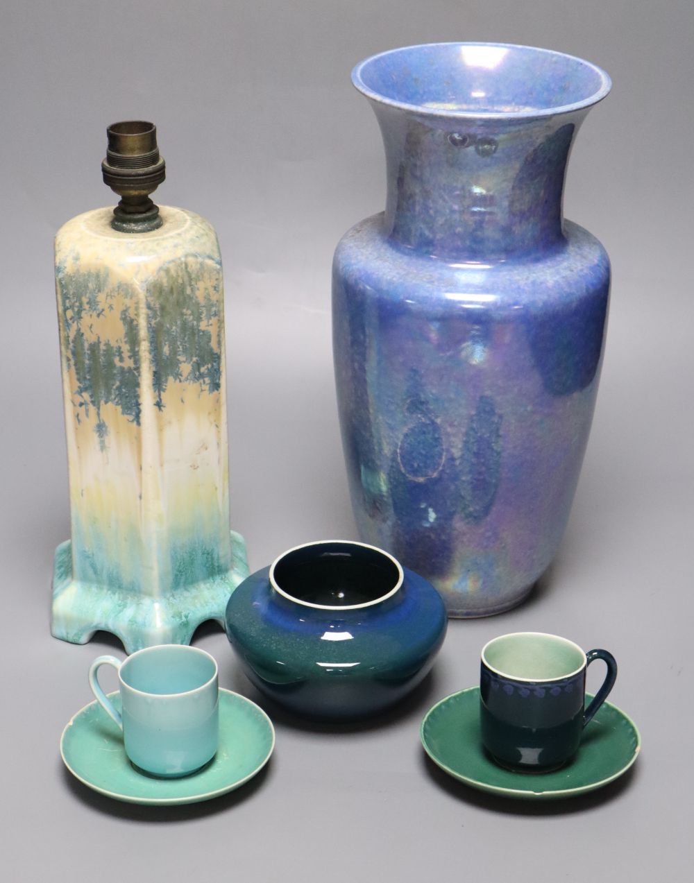 A collection of Ruskin pottery, including a blue lustre vase,
